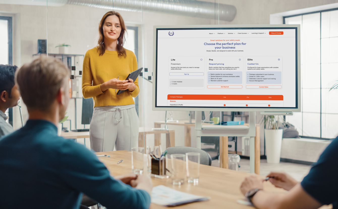 A executive board member presenting options and comparing OHS Software